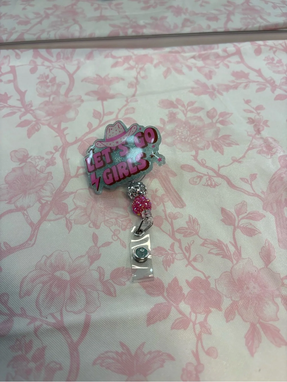Pink badge reel with beads